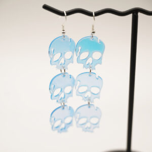 triple holo skull earrings