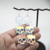 triple holo skull earrings