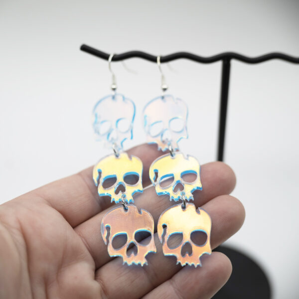 triple holo skull earrings