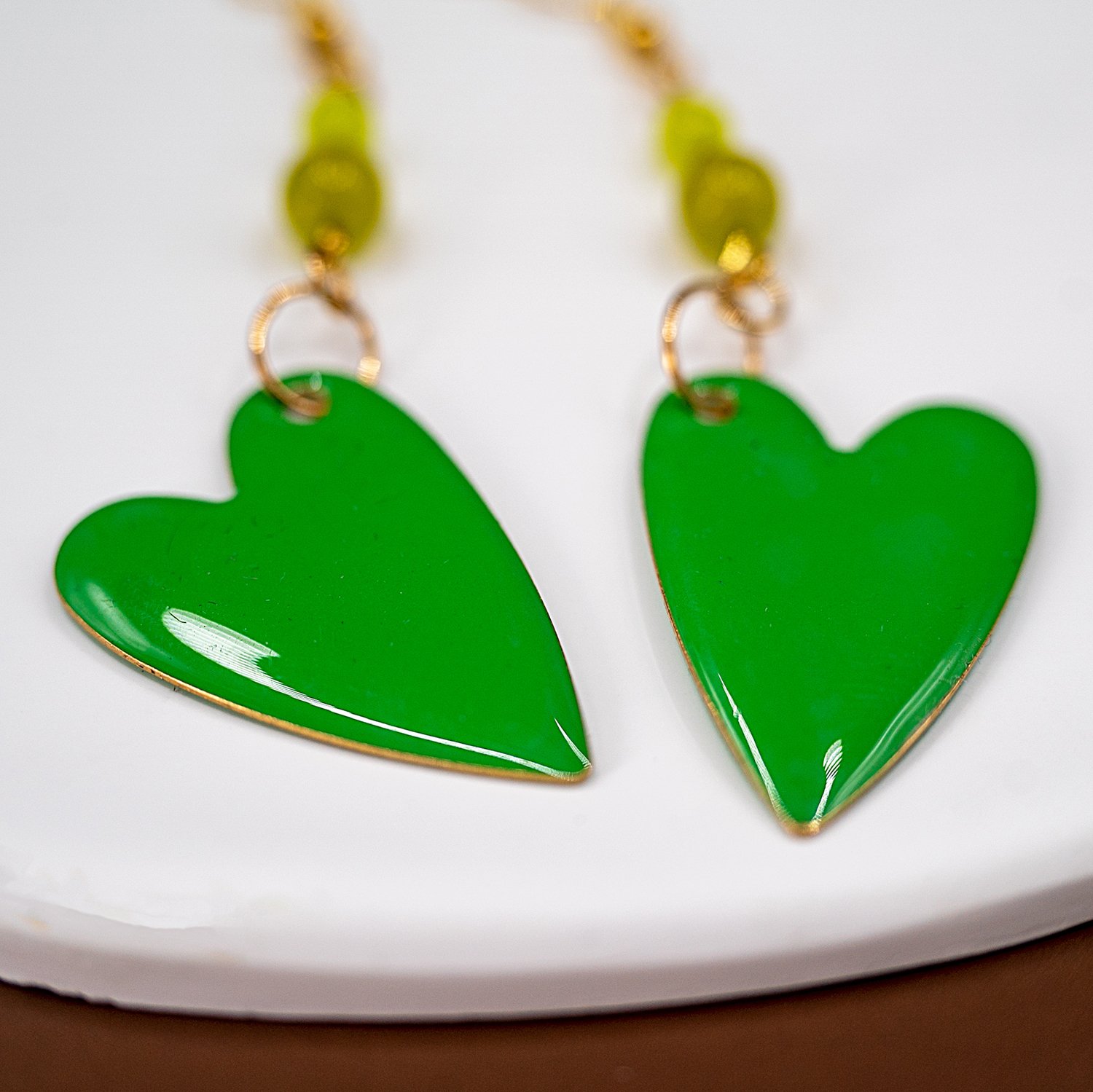 green heart earrings