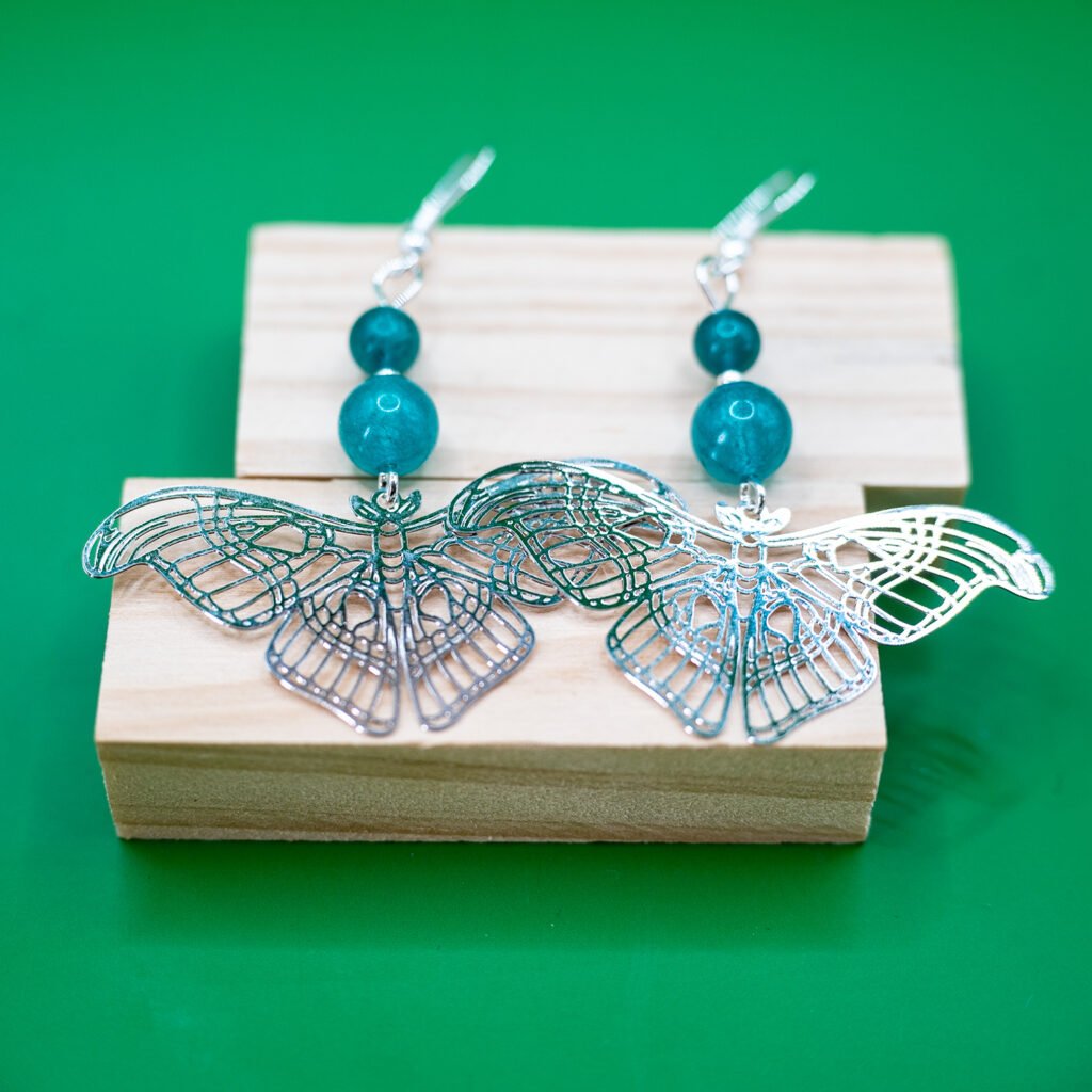 silver moth earrings